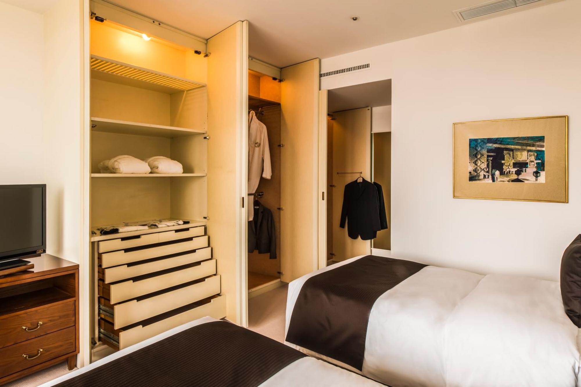 Imperial Hotel Prefektura Tokio Exteriér fotografie A bedroom at the hotel